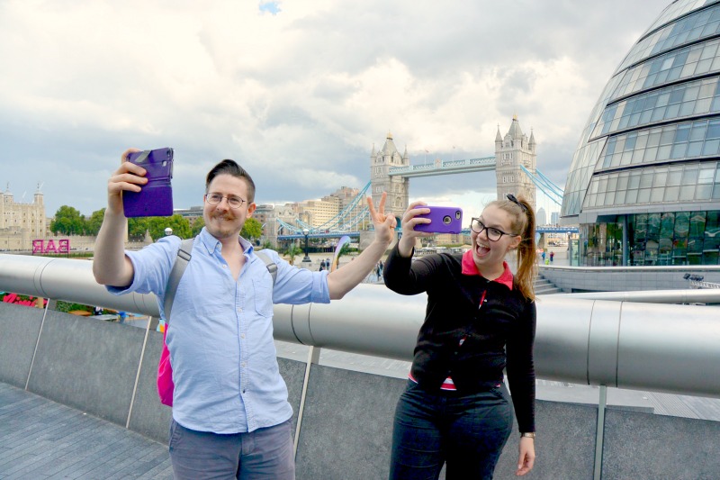 Selfies in front of the Tower Bridge in London